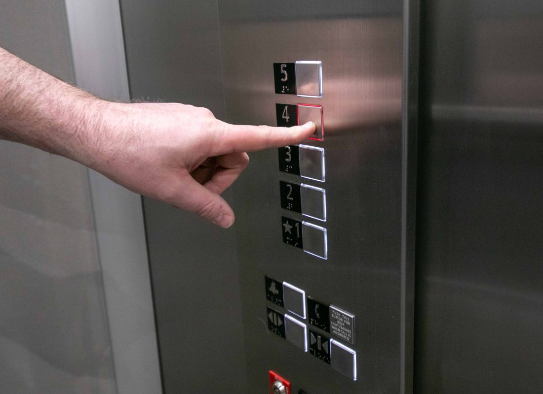 pushing elevator button