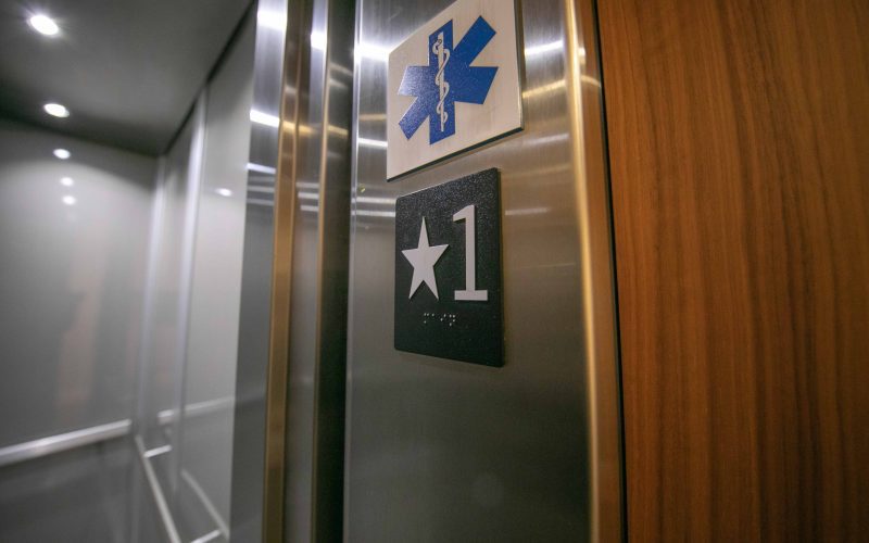 Elevator with medical sign over the floor number
